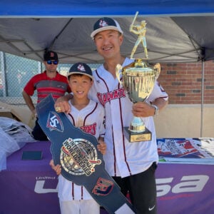 Father and son w travel baseball trophy and belt won at USSSA 2021 Int'l World Series 