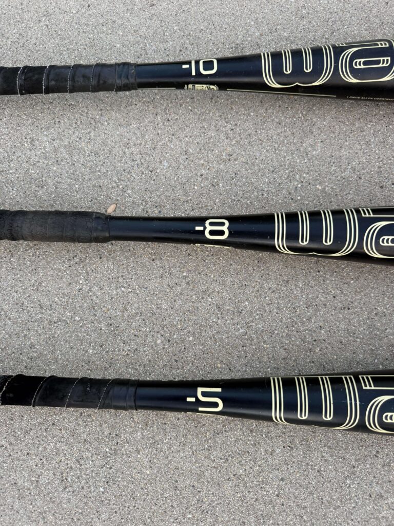 close up of 3 handle of warstic bonesaber bats to show different drops