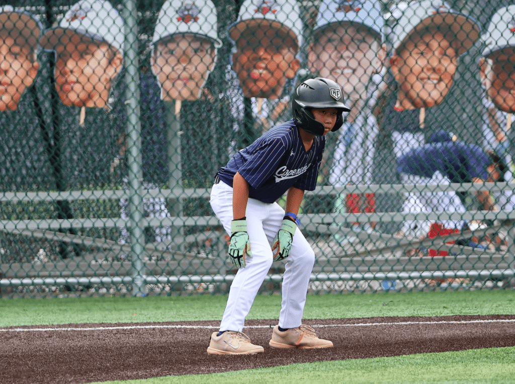 Brendan Chan action shot on the base path taking lead