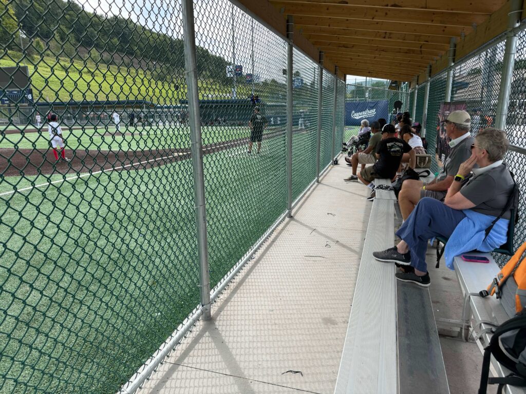 inside view of covered spectator dugout at All Star Village