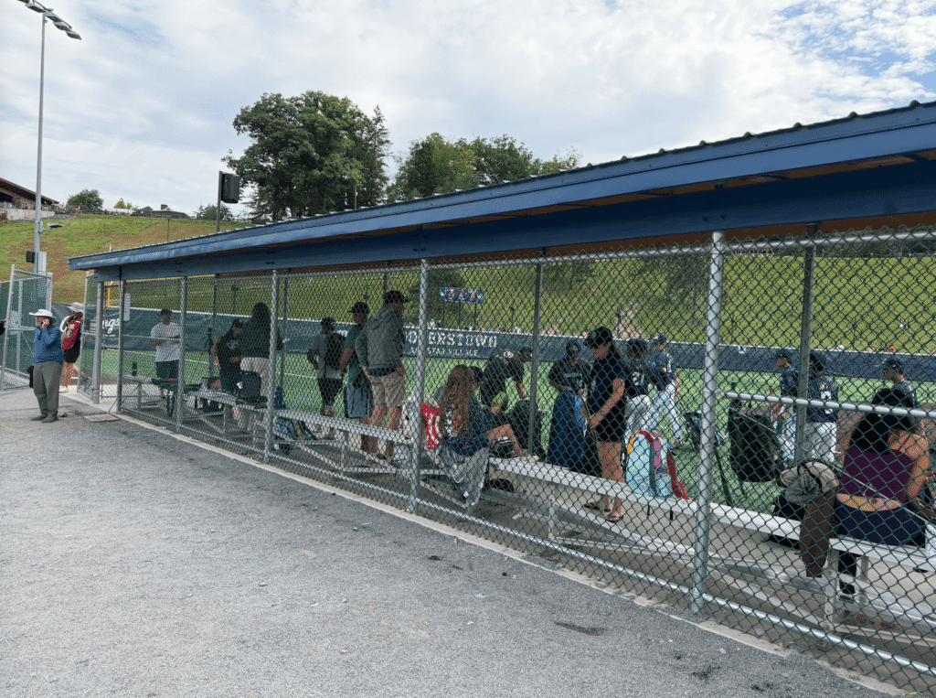 outside view of covered spectator dugout
