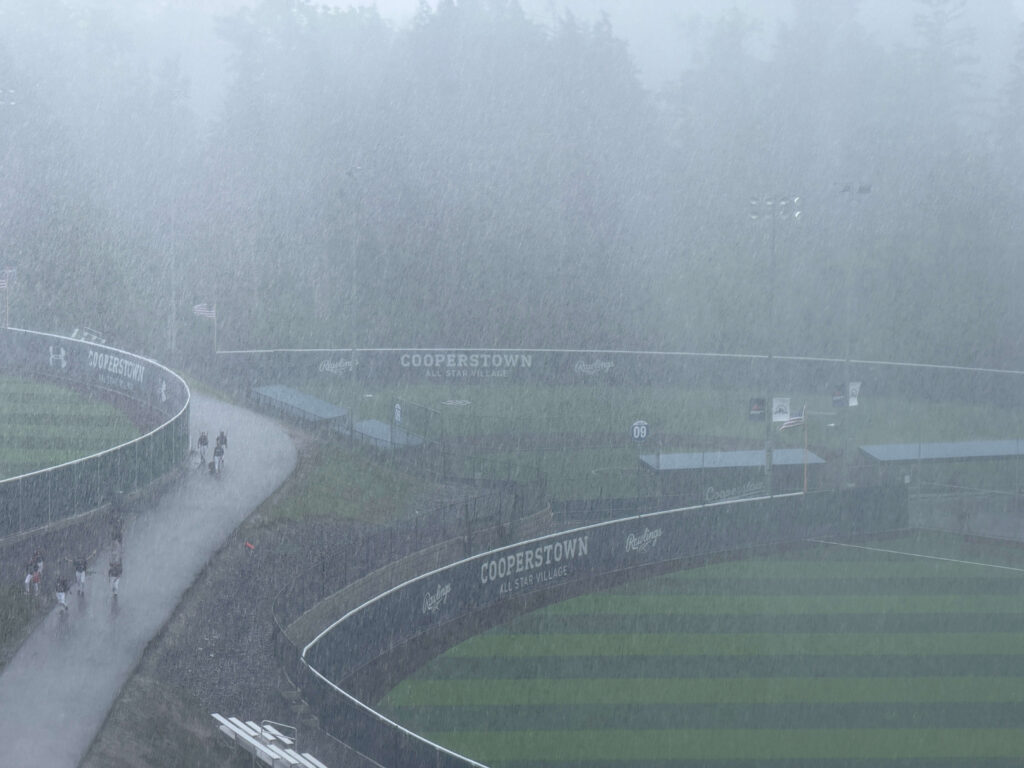 Overview view of baseball fields and rain coming down