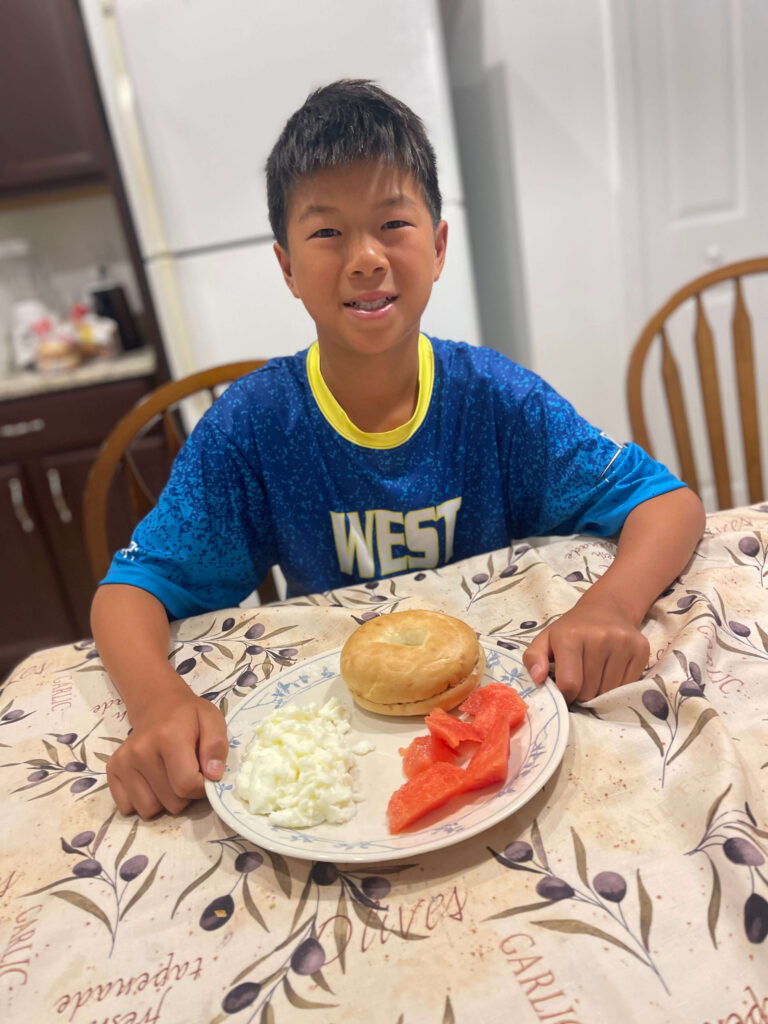 Ethan with pre tournament breakfast meal at 11 years old