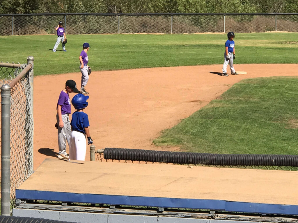 7 year old boys playing in scrimmage at Dan Spring's fall baseball league