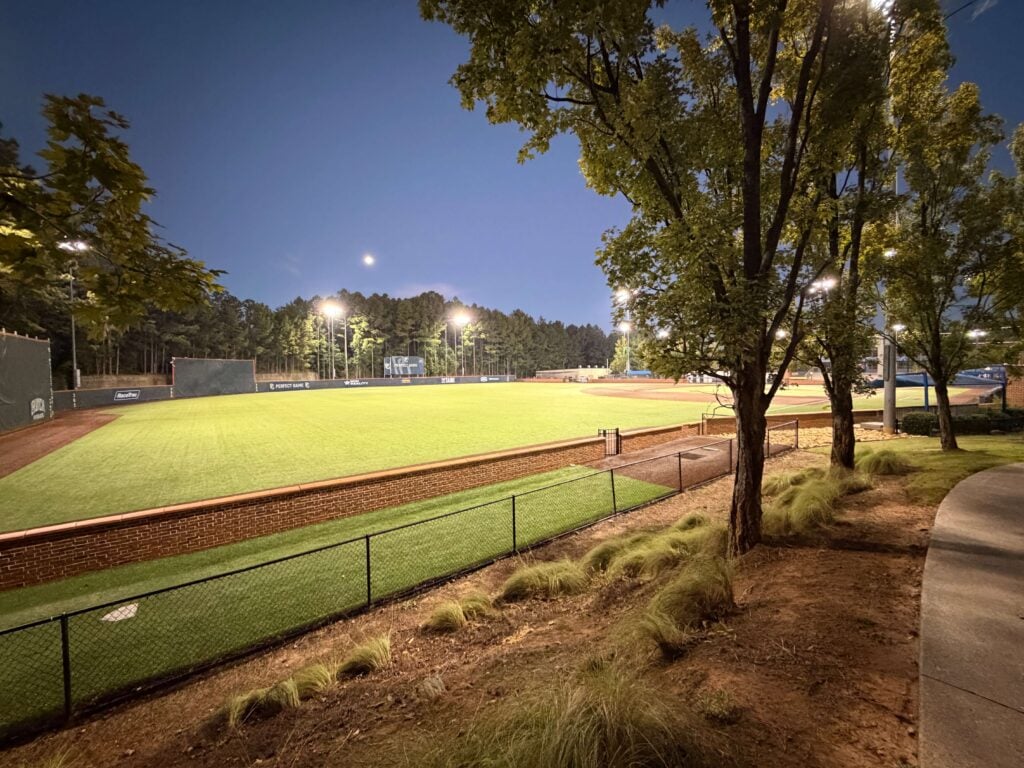 Early morning view of a lighted artificial turf baseball diamond at the East Cobb Baseball Complex in Atlanta, Georgia