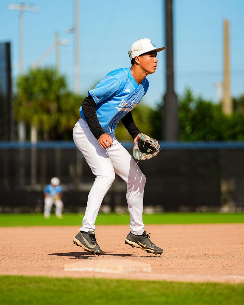 15U travel baseball player Ethan Chan fielding his position at third base for the Wow Factor national team.